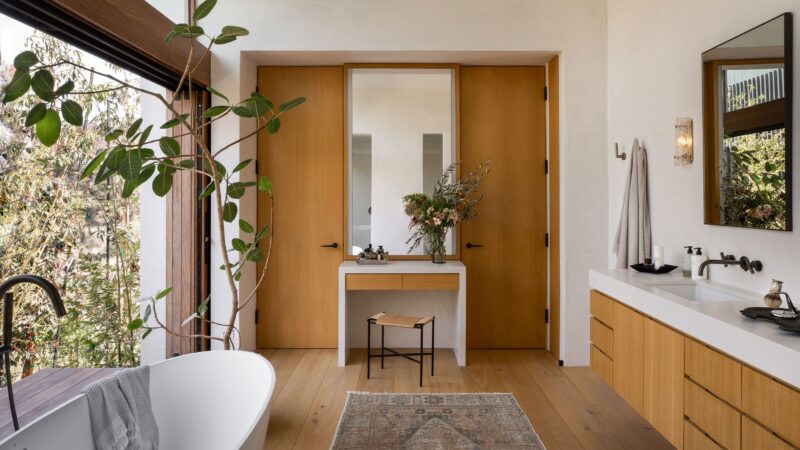 How do people make bathrooms sustainable and environmentally friendly?